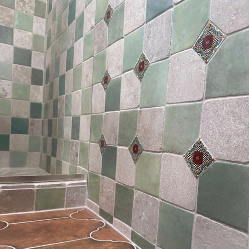 Teal and grey tile in a traditional shower renovation
